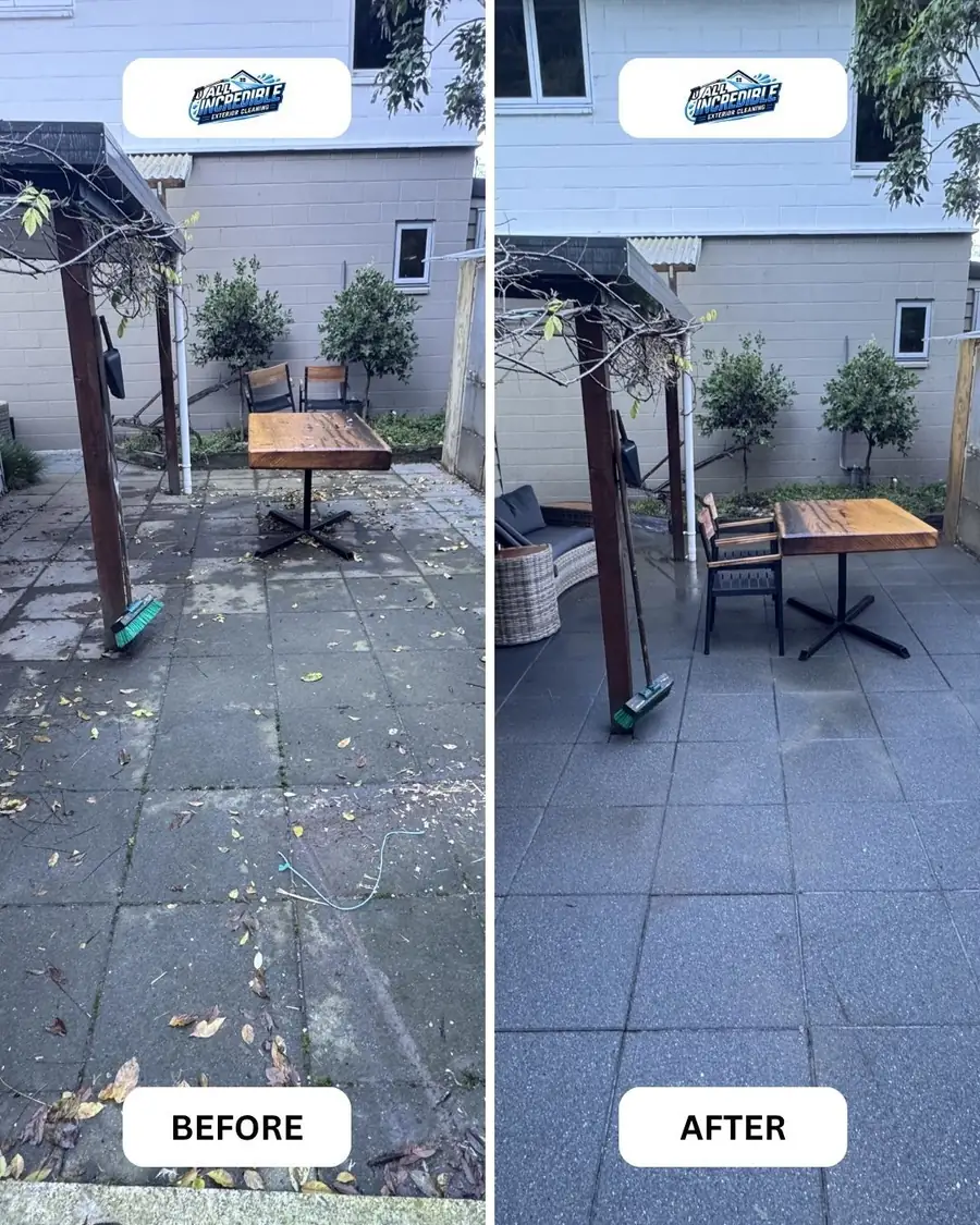 A paved patio half cleaned to show the before and after